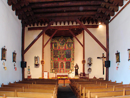 Altar Area, San Francisco de Asis Mission Church, Taos, New Mexico. Hikes, Travels, & Tours. Photos, Pictures, Images, & Reviews.