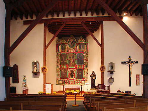 Altar Area, San Francisco de Asis Mission Church, Taos, New Mexico. Hikes, Travels, & Tours. Photos, Pictures, Images,& Reviews.
