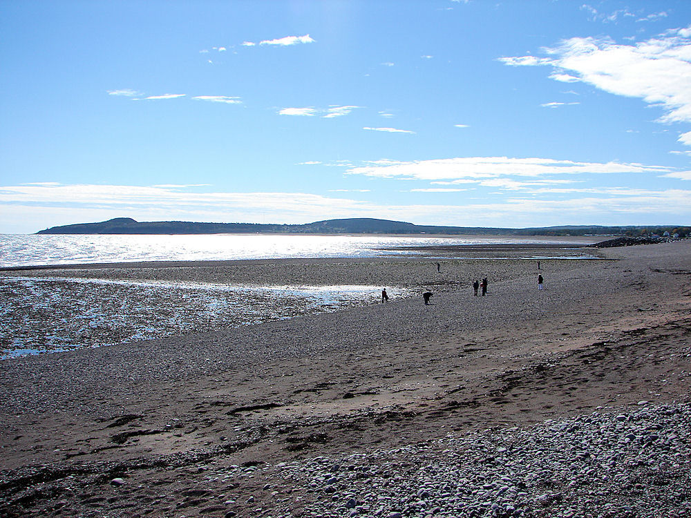 Saint Martins Beach. People Searching For A Coveted 'Wish Rock.' New Brunswick, Canada. Travel, Tours Photos, Pictures, Information, & Reviews.