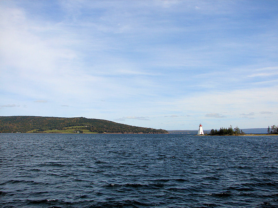 Beinn Bhreagh & Kidston Island Light House; From The 'Amoeba' Port As We Sail The Bras D'or Lakes at Baddeck, Nova Scota with Amoeba Sailing Tours. Travels, Tours, Photos, Pictures, Images, Information, & Reviews.