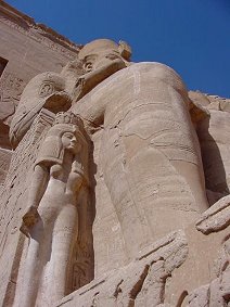 Colossi Of Ramses II or 2 With Nefertari. Abu Simbel Egypt Ruins Travels And Tours Photos, Pictures, Images, Descriptions, Information, & Reviews.