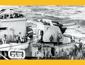 Ernie Pyle In A 'Bucket' Being Brought Onto The USS Cabot,  Aircraft Carrier, WW II, Pictures, Photos, Images, Information, History, & Reviews.