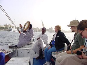 Audrey DeLange On Felucca  Sailing Boat, Nile River, Aswan, Egypt. Travel & Tour Pictures, Photos, Images, Descriptions, Information, & Reviews.